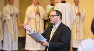 Adam Bartlett directs the choir during Lincoln’s recent Sacred Music Clinic.