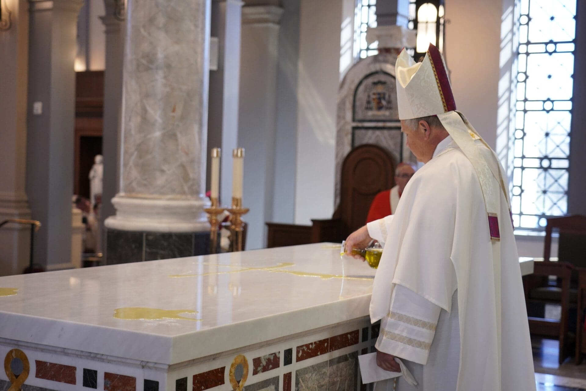 Q: How is an altar initiated according to the rites of the Church?