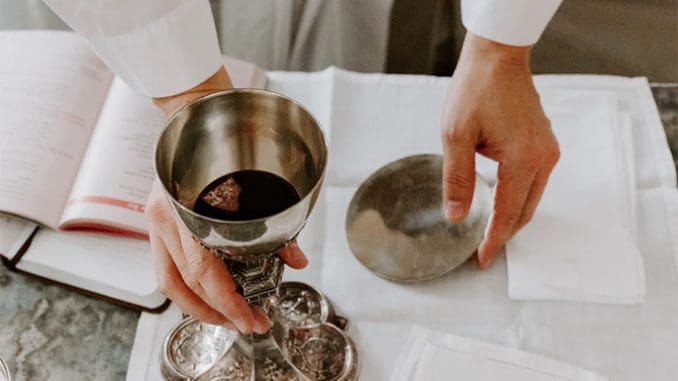 What does it mean to “host” Jesus in the Eucharist?